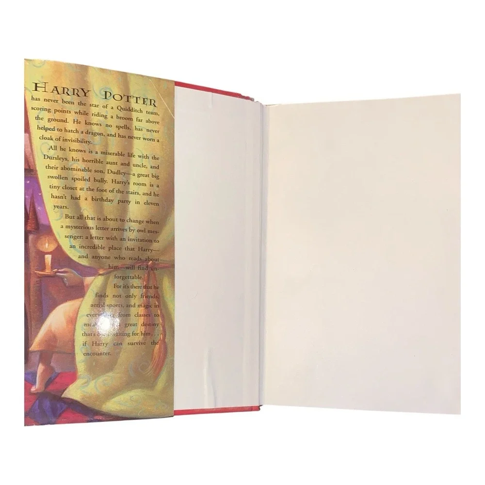 Harry Potter and the Sorcerer's Stone by J. K. Rowling (1998,‎ Hardcover)